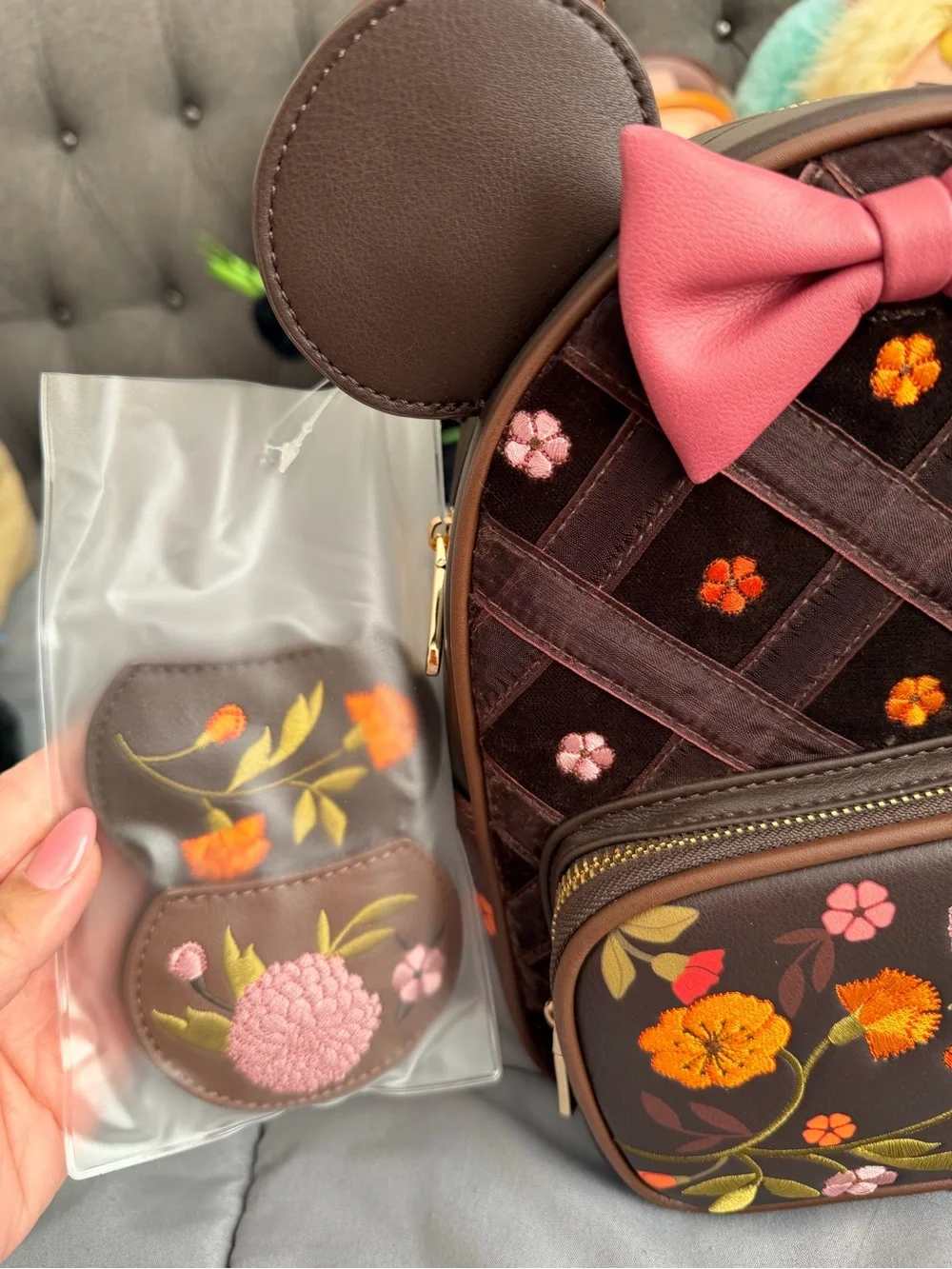 Loungefly Fall Floral Embroidered Brown Backpack with Pink Bow and applique.